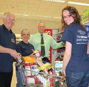 Lichfield Festival volunteers with Midlands Co-Op store manager Mark Green 