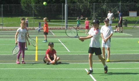 Young players testing out the refurbished Beacon Park tennis courts