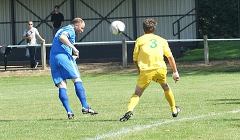 Lichfield captain Todd Perry heads towards goal. Pic: Mick Tyler