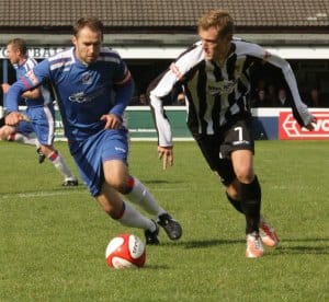 Chris Slater keeps a close eye on his man. Pic: Dave Birt