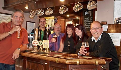 Staff and regulars get ready for the Queens Head reopening