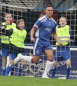 Theo Robinson celebrates his goal against Rugby Town. Pic: Dave Birt