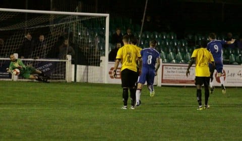 Lee Evans saves a penalty. Pic: Dave Birt