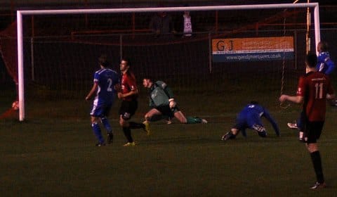 Ashley Sammons scores Redditch's second goal. Pic: Pamela Mullins