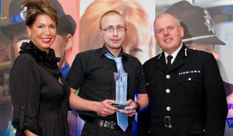 Ben Wilson receives his award from Sue Arnold and Chief Constable Mike Cunningham