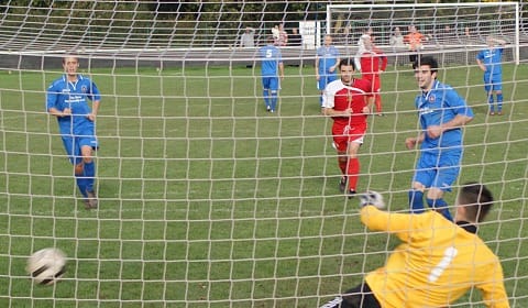 Liam Holt scores from the penalty spot. Pic: Mick Tyler
