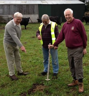 The winning cow pat is inspected