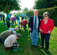 Robert and Christina Wornham join other volunteers to plant bulbs at the National Memorial Arboretum