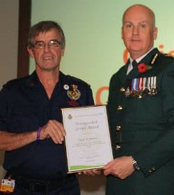 Keith Dawson collecting the award