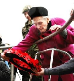 Dorothy Ellis lays a wreath at the National Memorial Arboretum
