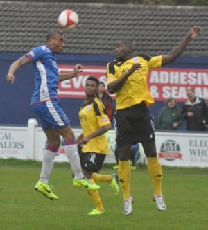 Tesfa Robinson heads clear. Pic: Pamela Mullins