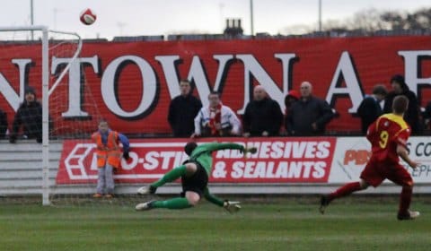 Lewis Clarkson beats Chasetown keeper Ryan Price. Pic: Dave Birt