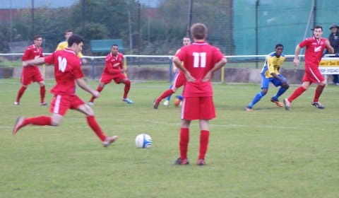 Liam Holt fires home a free kick. Pic: Mick Tyler