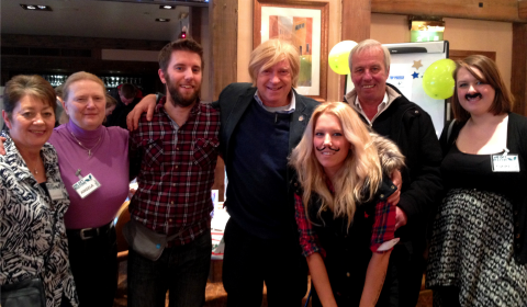 Michael Fabricant with Angela, Bob, Gemma, and Paul Russell and their extended family after the opening of charity Christmas Fayre