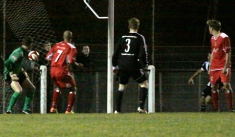 Ryan Price can only watch as Coalville Town make it 2-0. Pic: Dave Birt