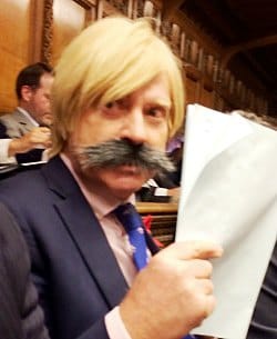 Michael Fabricant MP with his false moustache in the House of Commons