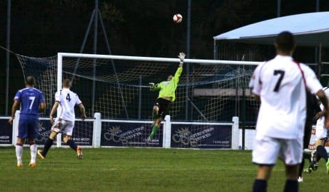 Simon Brown's chip beats the keeper. Pic: Dave Birt