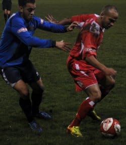 Simon Brown is closed down by a Leek defender. Pic: Pamela Mullins