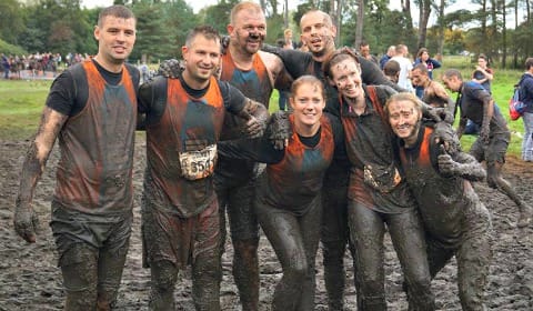 Competitors celebrate completing the Xtreme Challenge race