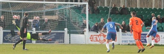 Simon Brown makes it 2-0 from the penalty spot. Pic: Dave Birt