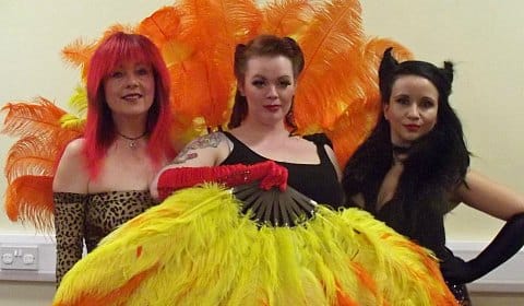 Ruth Huddleston as a demonic barman, Emma Allen as Lucifer and Ruth Adams as The Devil
