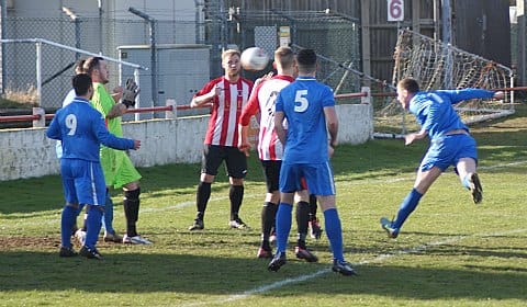 Leon Morgan's header tests the Atherstone defence. Pic: Mick Tyler