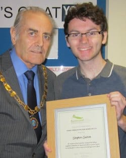 Cllr Ron Bradbury, former Chairman of Burntwood Town Council, presenting Stephen Sutton with his Civic Award in 2014