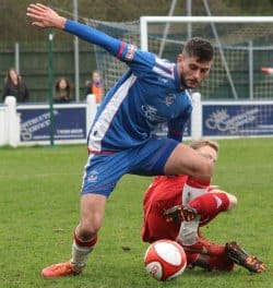 Luke Chapman holds off a challenge. Pic: Dave Birt