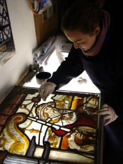 Restoration work is carried out on one of Lichfield Cathedral's glass panels