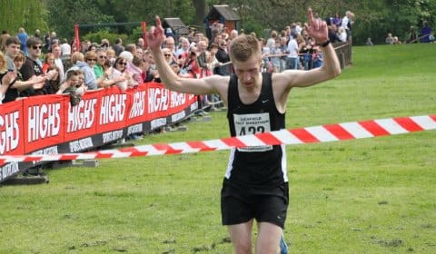 Alec Bednall crosses the line