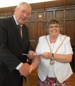 Cllr Norma Bacon, Mayor of Lichfield, presents the cheque to Colin Ablitt, board member of Lichfield Festival Ltd