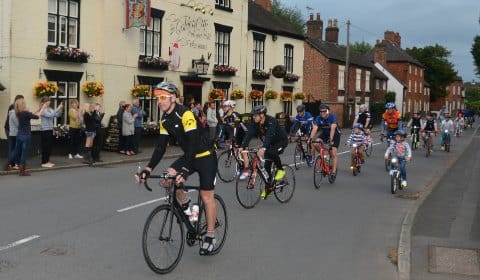 The police cyclists are joined by other riders for the final part of their charity challenge