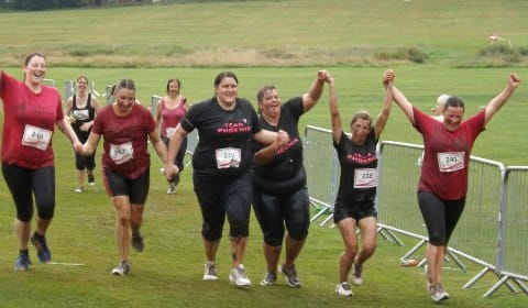 The Phoenix Fit Camp team crossing the finish line