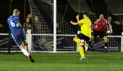 Lee Downes takes aim to put Chasetown in front against Newcastle Town. Pic: Dave Birt