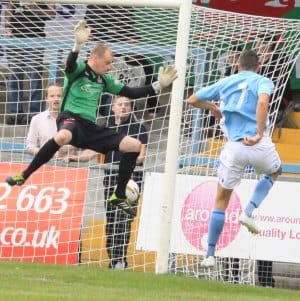 Jamie Towers squeezes the ball into the net. Pic: Dave Birt