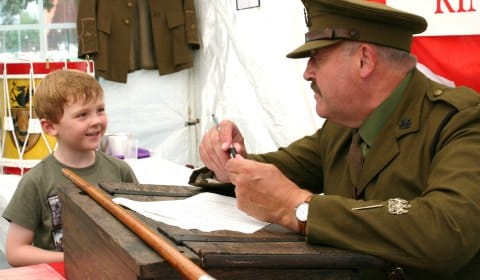 A young visitor to the Staffordshire Regiment Museum learning about life during the Great War