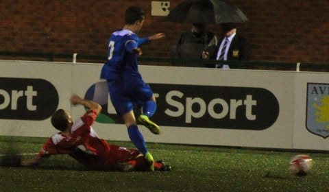 Grant Beckett slides in to clear. Pic: Pamela Mullins