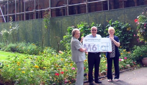 Anita Brookes and Sheila Murphy with David Chalaye outside St Anne's Church in Burntwood