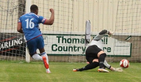 Nathan Waite slips the ball beyond the keeper. Pic: Dave Birt