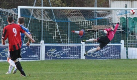 John Bateman can get nowhere near Lee Cropper's strike. Pic: Dave Birt