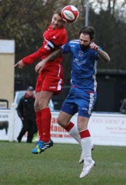 Nick Wellecomme puts the Kidsgrove skipper under pressure. Pic: Dave Birt