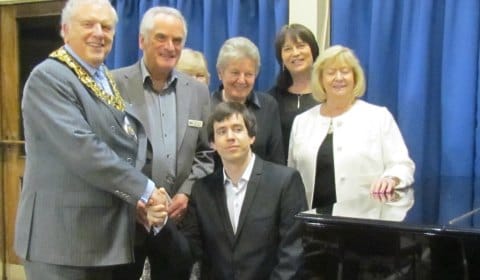 Cllr David Smith with concert pianist Mario Mora, Cllr Janet Eagland and members of Lichfield Sinfonia 