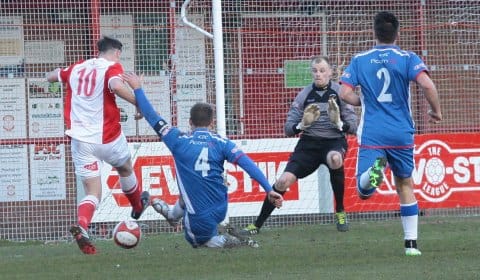 Chris Slater makes a timely challenge. Pic: Dave Birt