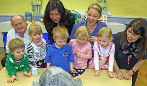 Busy Bees staff meet with some of the children