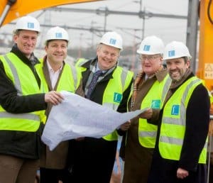 Alex Morgan, director of Stoford, Tony Nash, director of Stoford, Mark Winnington, Staffordshire County Council, David Frost, Stoke-on-Trent and Staffordshire LEP, Andrew Blevins, managing director of Liberty Property Trust UK, during a visit to the Lichfield Park development
