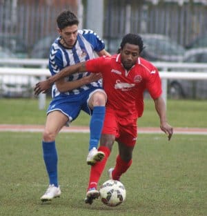 Action from Lichfield City's trip to Nuneaton Griff. Pic: Mick Tyler