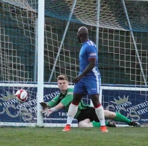 Curtis Pond can't keep out Joel Purkiss' effort. Pic: Dave Birt