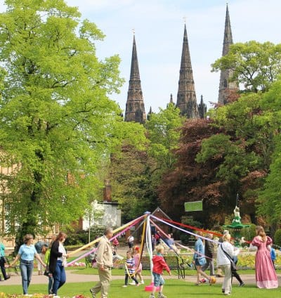 Maypole dancing in Museum Gardens
