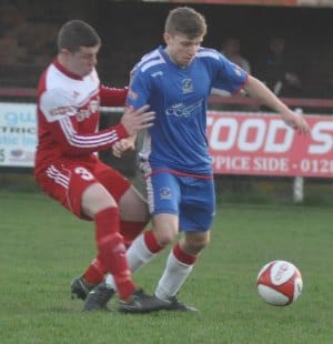 Danny Griffiths holds off his marker. Pic: Pamela Mullins