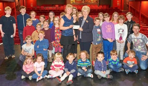 Louise Glynn receives the cheque from Maureen Woodcock, MBE, chairperson of the Friends of the Lichfield Garrick